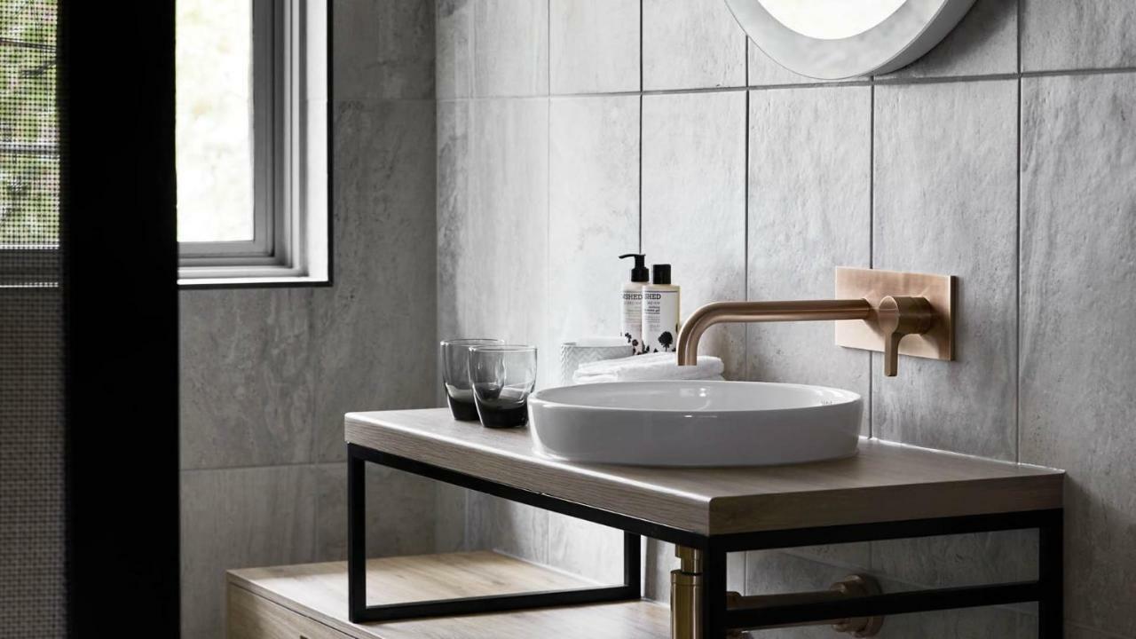 Zagame'S House Hotel Melbourne Exterior photo A wall mounted tap